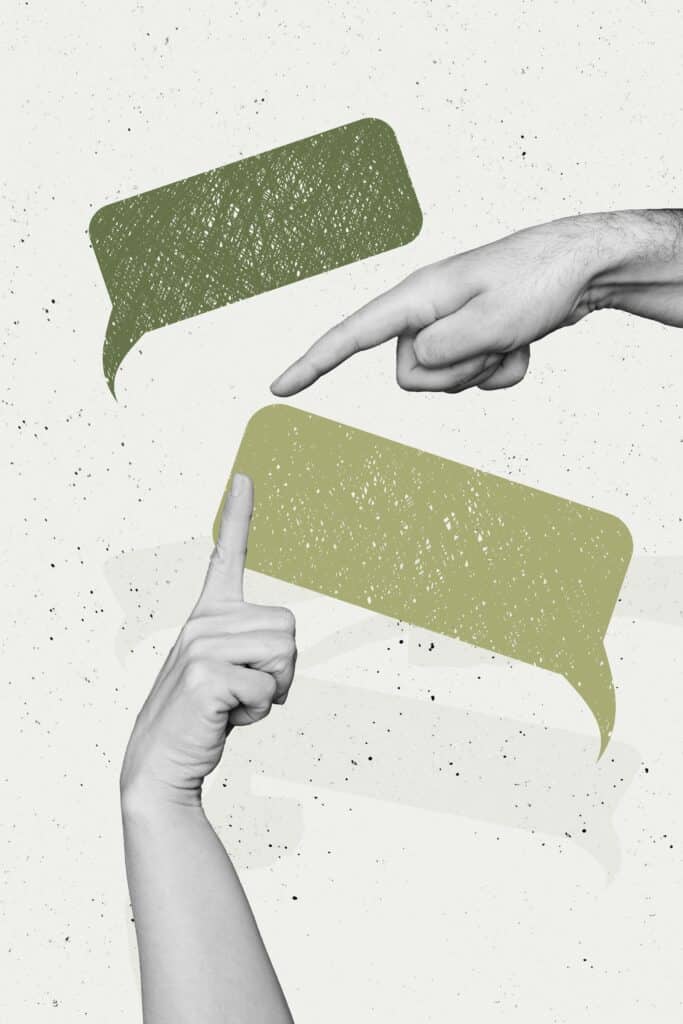 Two fingers, reminiscent of the Birth of Adam, almost touching around two green dialogue balloons.