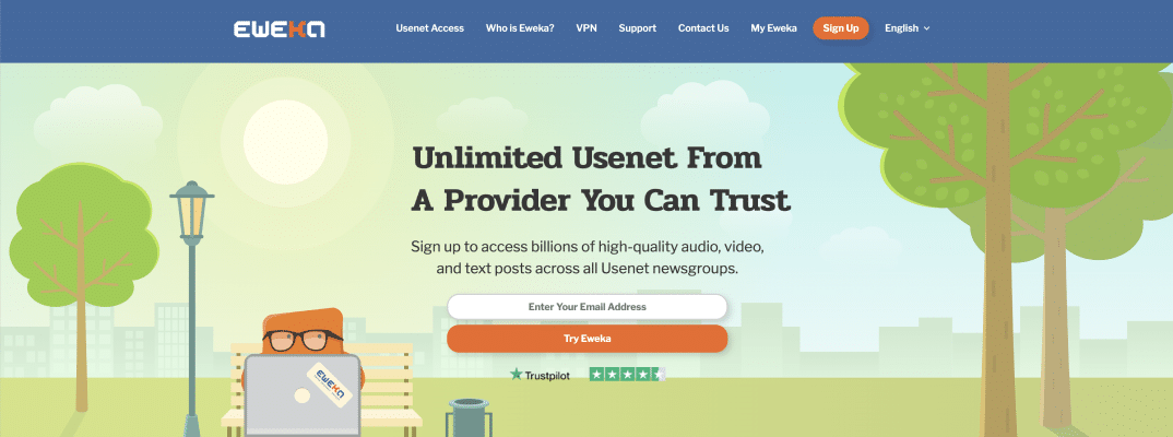 A cartoon park with an orange blob person sitting on a bench using a laptop.